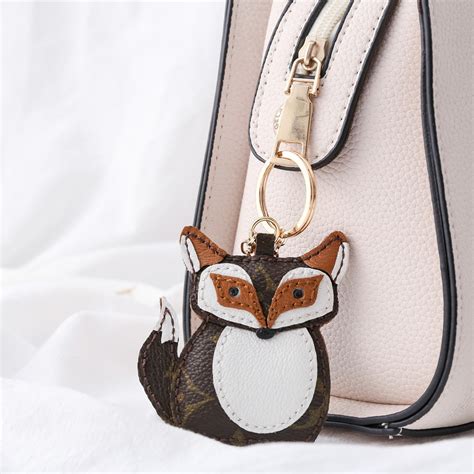 louis vuitton fox keychain|real louis vuitton keychain.